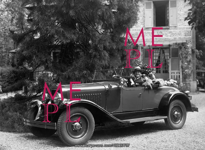  : Maurice Chevalier in his car, 1939
