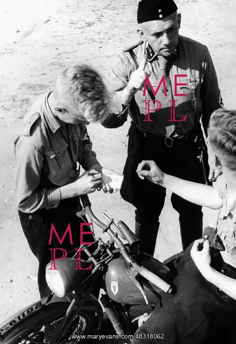 : Members of the Motor HJ at driving lessons, 1938 : Members of the Motor HJ at driving lessons, 1938