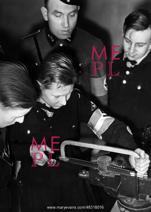  : Members of the Motor HJ at workshop training, 1942