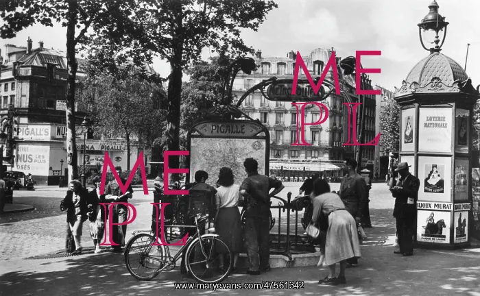 : Members of the public stop to look at a map