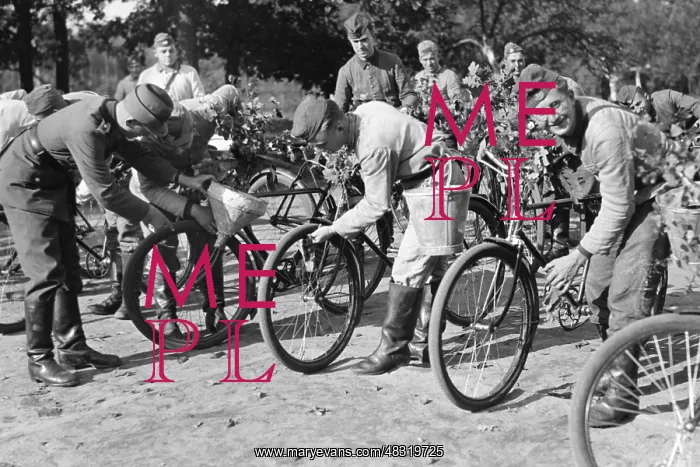 : Members of the RAD clean their bicycles, 1937 : Members of the RAD clean their bicycles, 1937