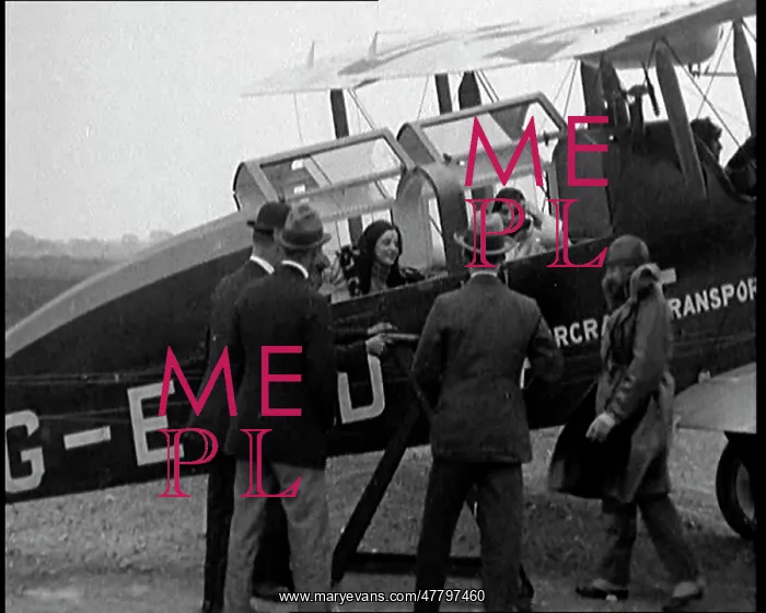 : Men Approaching A Passenger Biplane As It Comes : Men Approaching A Passenger Biplane As It Comes