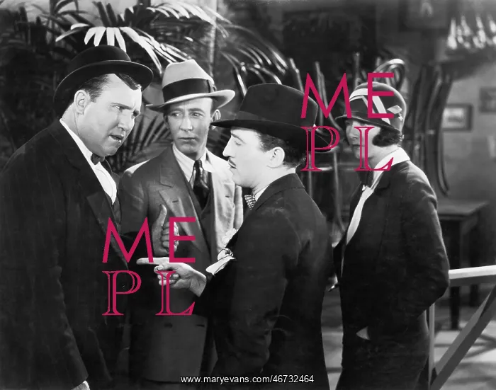 : Three men in an argument while a woman looking on : Three men in an argument while a woman looking on