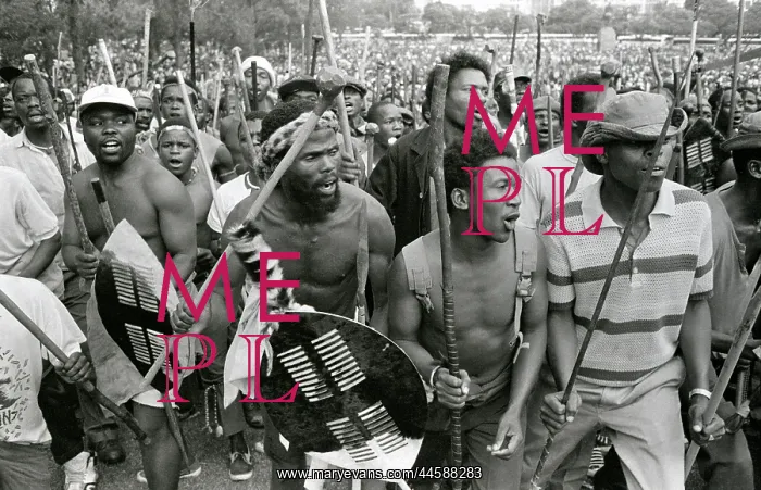 : Men, armed with traditional weapons, and some : Men, armed with traditional weapons, and some