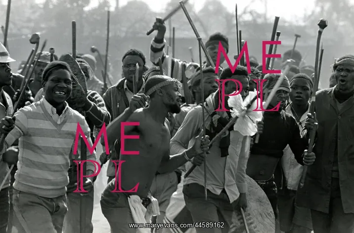 : Men, armed with traditional weapons, and some : Men, armed with traditional weapons, and some