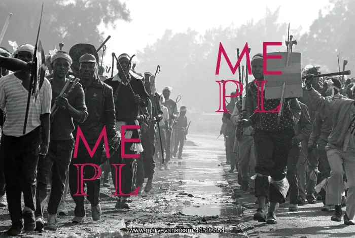 : Men, armed with traditional weapons, run in military : Men, armed with traditional weapons, run in military