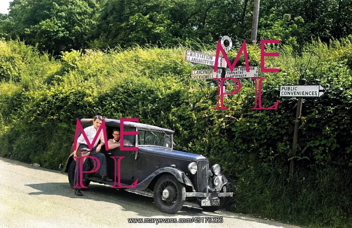 : Two men with Austin car : Two men with Austin car