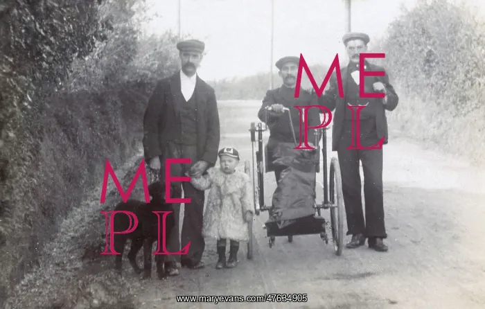  : Three men and a boy with a dog