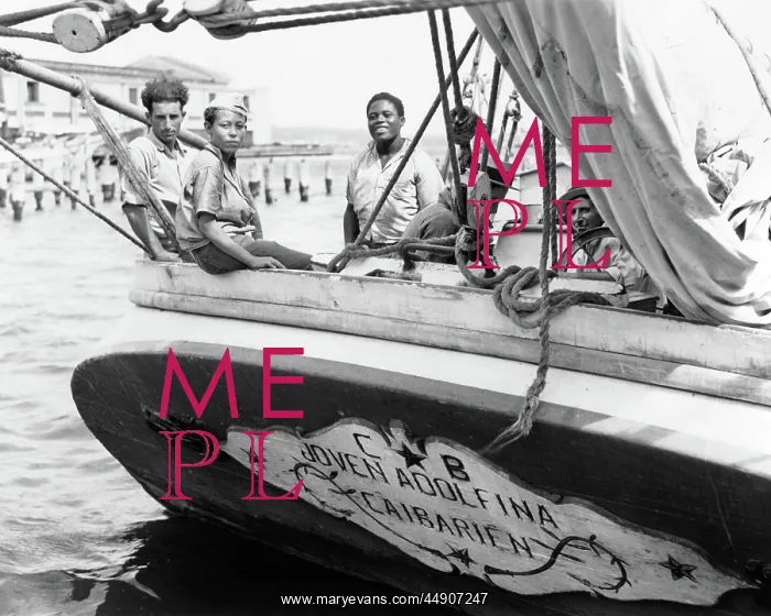 : Men and Boy at Stern of Trading Schooner Looking at Cam : Men and Boy at Stern of Trading Schooner Looking at Cam