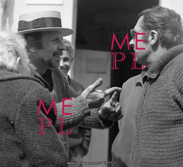 : Men chatting in the street : Men chatting in the street