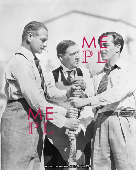 : Three men competing who will start first on a baseball bat : Three men competing who will start first on a baseball bat