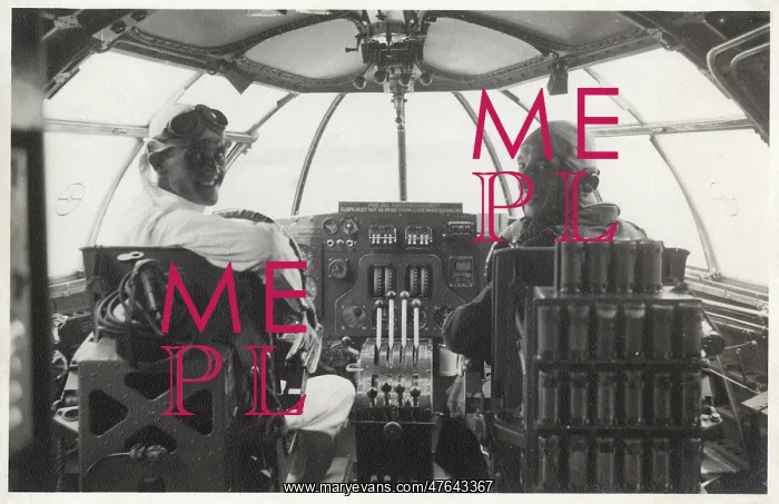 : Two men at the controls of a Sunderland flying boat : Two men at the controls of a Sunderland flying boat