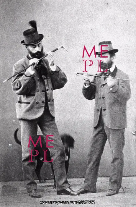 : Two men in costume. Testing their sticks. About 1910 : Two men in costume. Testing their sticks. About 1910