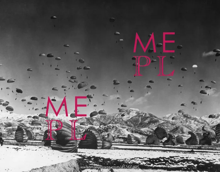: Men and equipment being parachuted to earth in an : Men and equipment being parachuted to earth in an