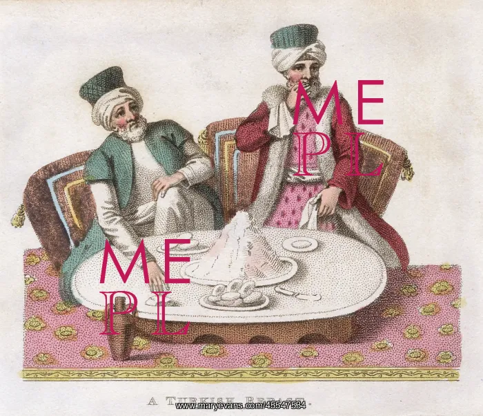 : Two men having a Turkish breakfast of yogurt and buns : Two men having a Turkish breakfast of yogurt and buns