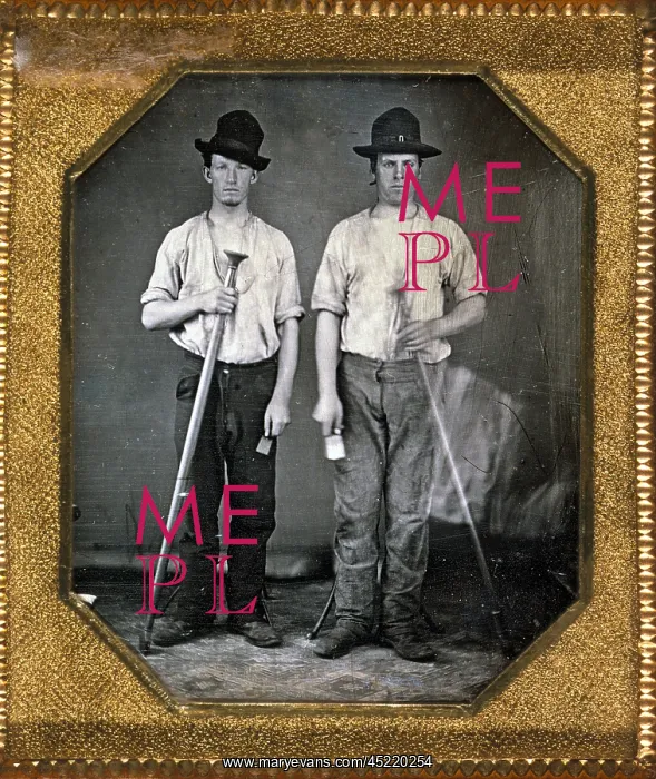 : Two men holding floor rammers, foundry tools ? : Two men holding floor rammers, foundry tools ?