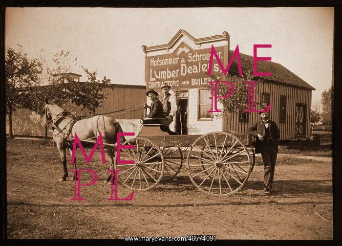 : Men with a horse and buggyn front of a lumber store : Men with a horse and buggyn front of a lumber store