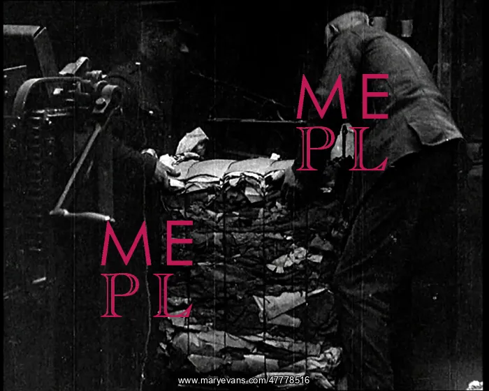 : Men Loading Bales Of Salvaged Cloth Onto A Cart : Men Loading Bales Of Salvaged Cloth Onto A Cart