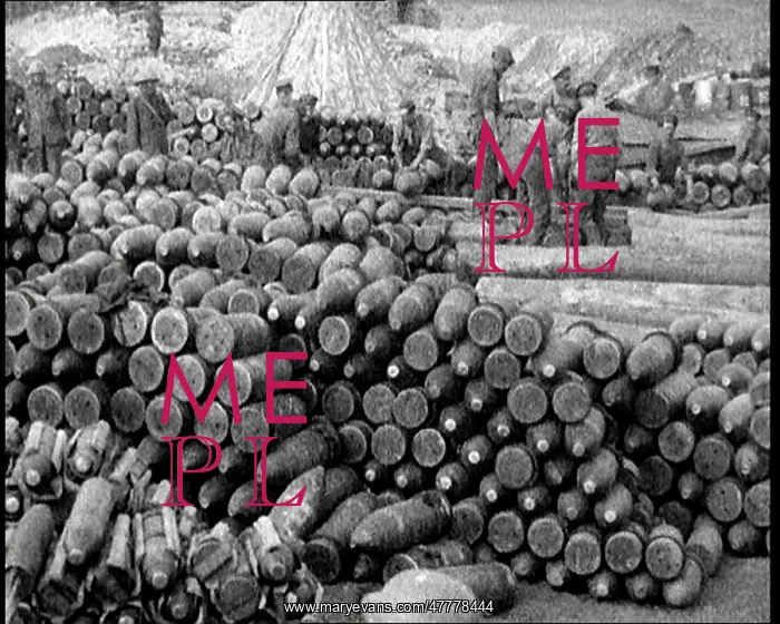 : Men Moving Ammunition Around on a Huge Stockpile : Men Moving Ammunition Around on a Huge Stockpile