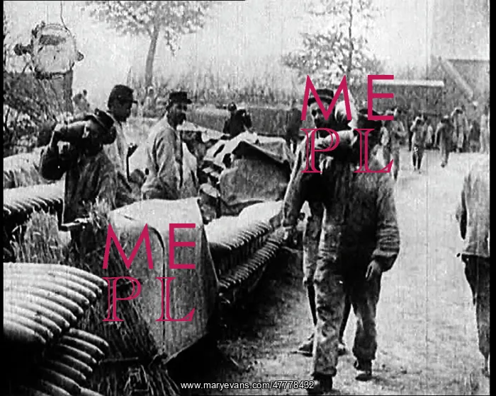 : Men Moving Small Artillery Shells Onto Large Stockpiles : Men Moving Small Artillery Shells Onto Large Stockpiles