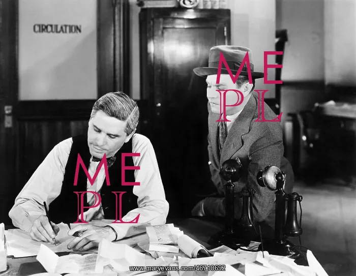: Two men at an office : Two men at an office