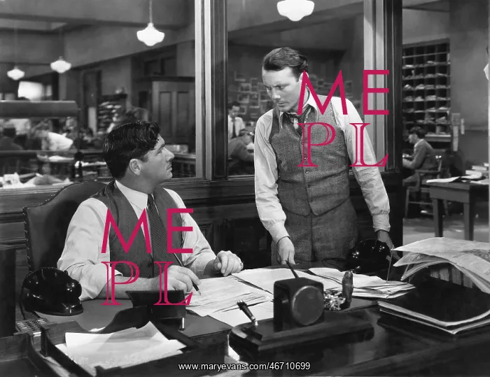 : Two men at an office : Two men at an office