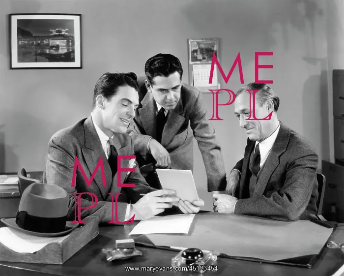 : Three Men at Office Desk Looking at Papers Tablet Meeting : Three Men at Office Desk Looking at Papers Tablet Meeting