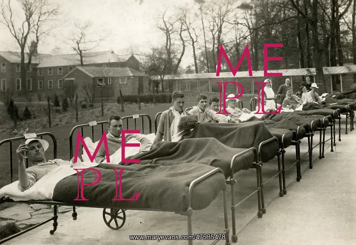 : Men in open-air hospital beds : Men in open-air hospital beds