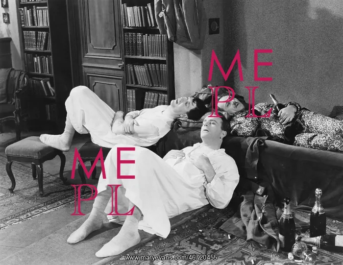 : Men passed out with champagne bottles : Men passed out with champagne bottles
