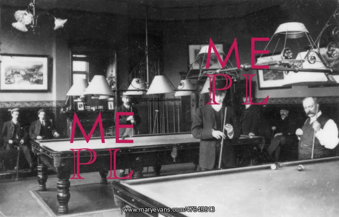  : Men playing billiards in a club
