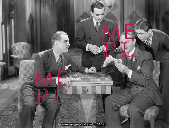 : Four men playing cards : Four men playing cards