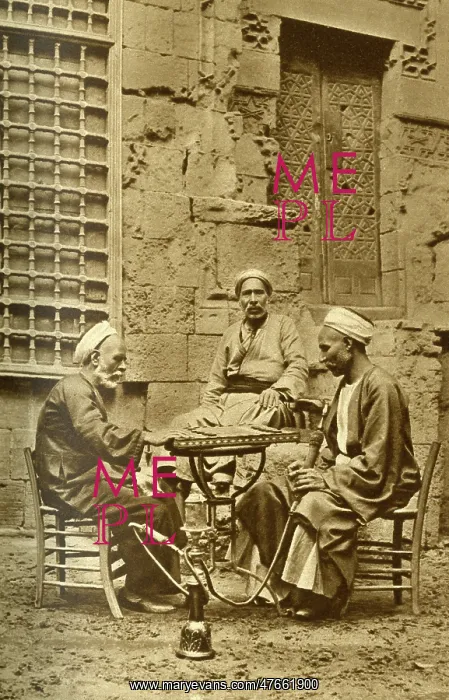 : Men playing game of draughts in a courtyard, Egypt : Men playing game of draughts in a courtyard, Egypt