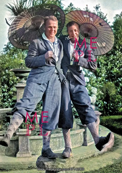 : Two men in plus fours, holding parasols : Two men in plus fours, holding parasols