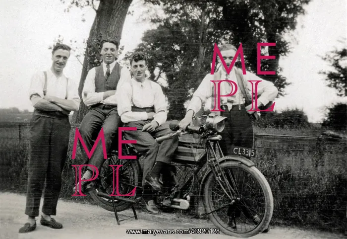 : Men pose with 1914 / 15 Triumph motorcycle : Men pose with 1914 / 15 Triumph motorcycle