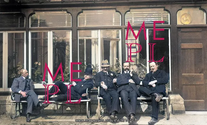 : Five men relaxing on a bench : Five men relaxing on a bench