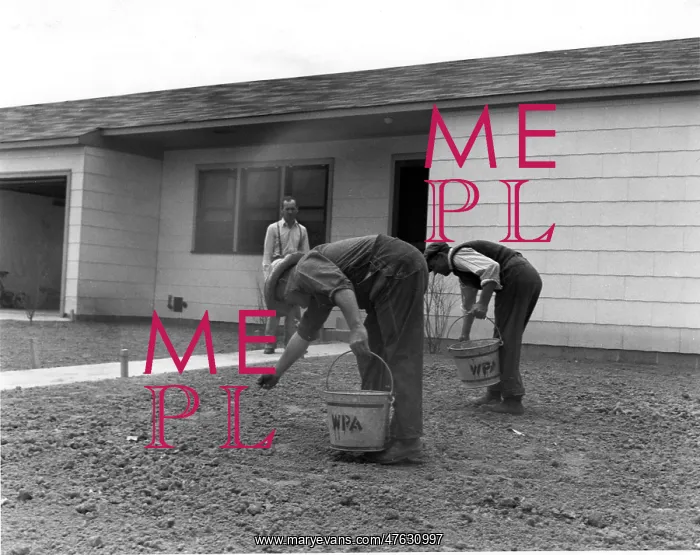  : Men Seeding a Lawn