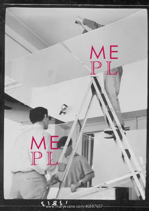 : Men setting up an exhibition, ICA, London : Men setting up an exhibition, ICA, London