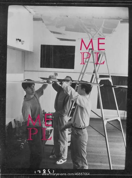 : Men setting up an exhibition, ICA, London : Men setting up an exhibition, ICA, London