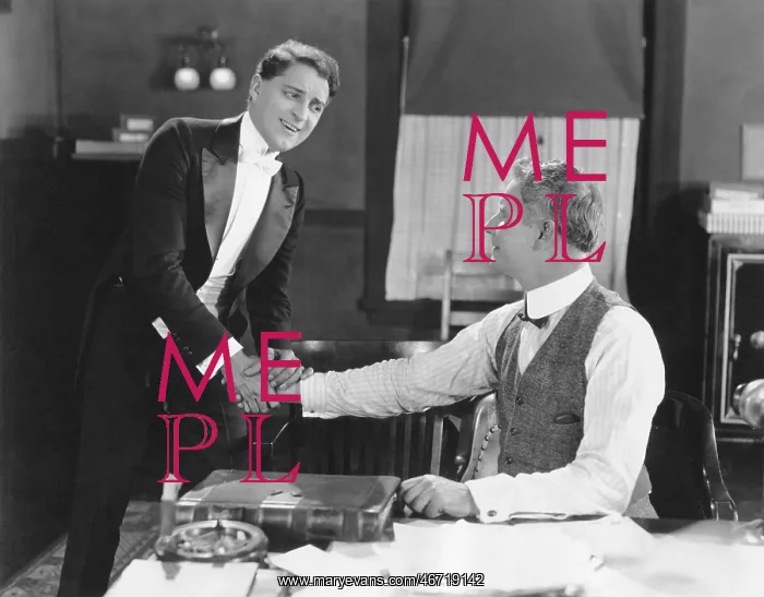 : Two men shaking hands : Two men shaking hands