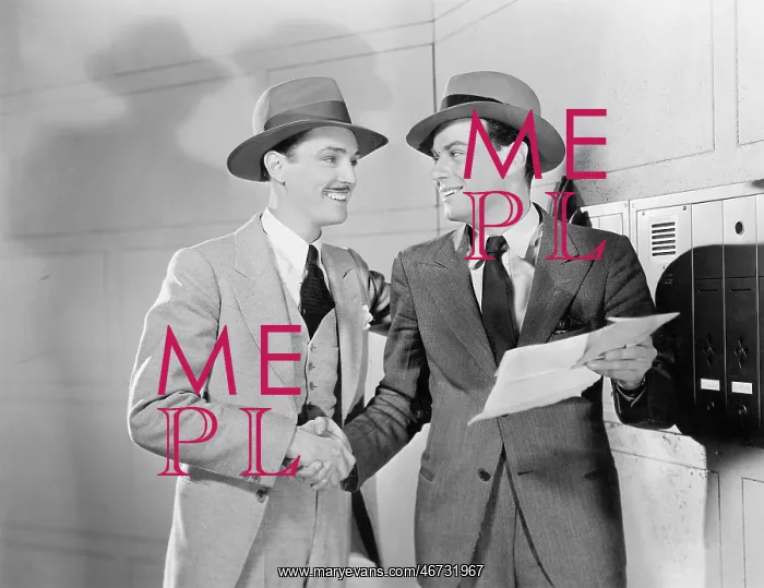 : Two men shaking hands : Two men shaking hands