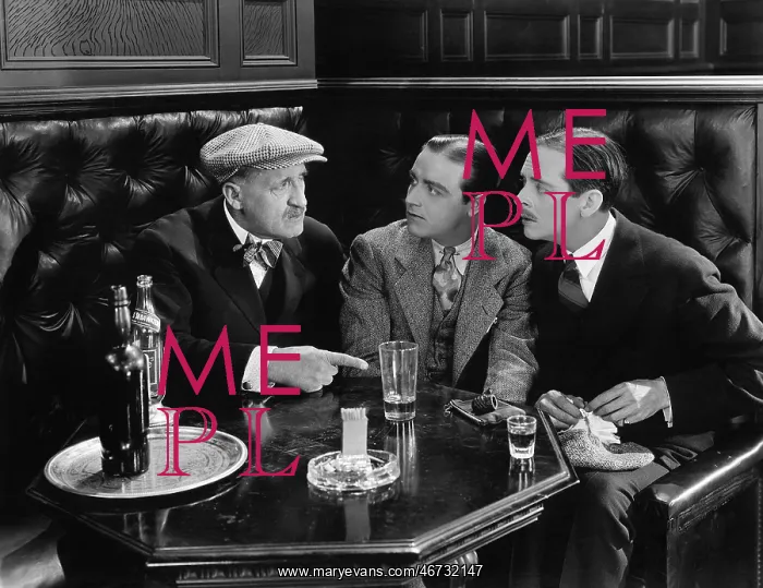 : Three men sitting together at a bar : Three men sitting together at a bar