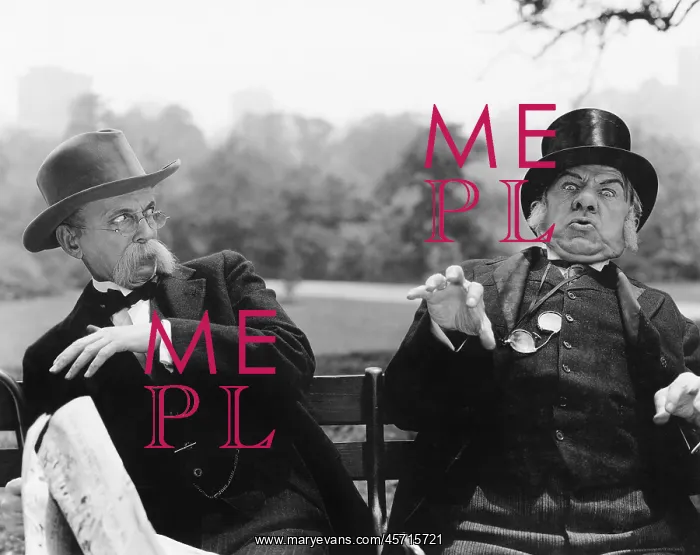 : Two men sitting on a bench looking shocked : Two men sitting on a bench looking shocked