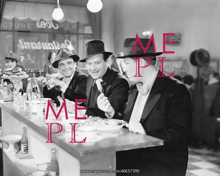 : Three men sitting at the counter of a diner : Three men sitting at the counter of a diner