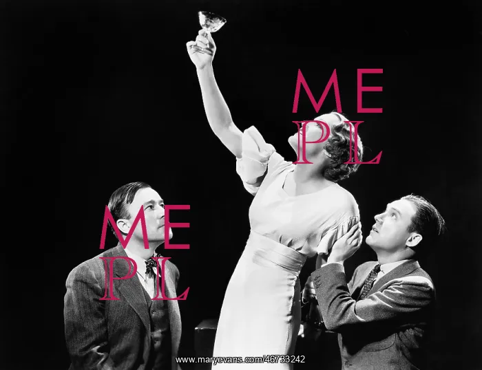 : Two men supporting a woman lifting her wine glass : Two men supporting a woman lifting her wine glass