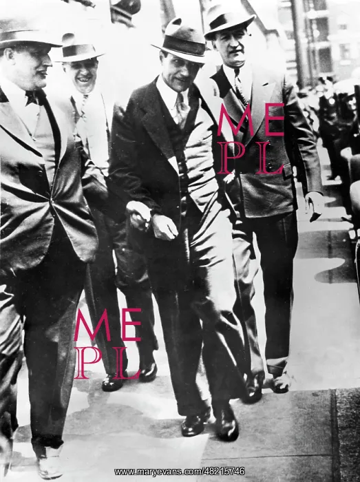 : Men walking along a street : Men walking along a street