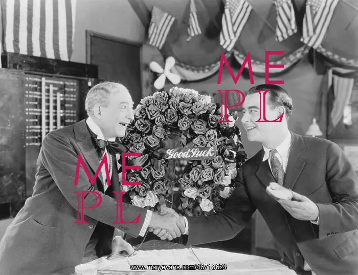 : Men wishing each other good luck : Men wishing each other good luck