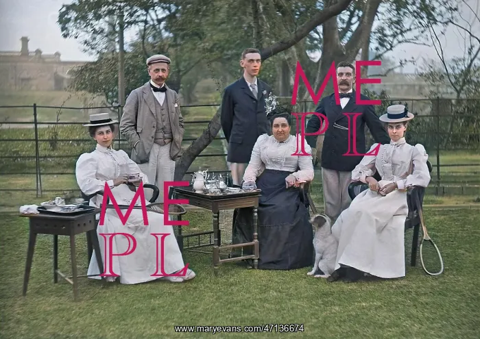 : Men and women taking tea in a garden : Men and women taking tea in a garden