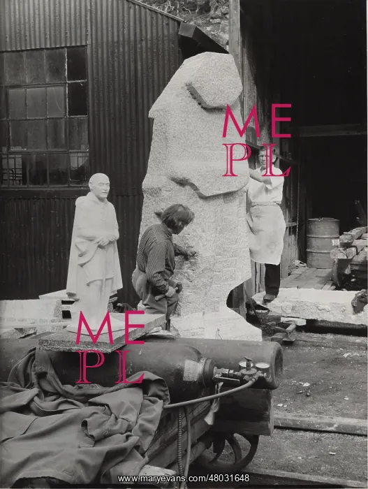 : Men working on Baden Powell statue : Men working on Baden Powell statue