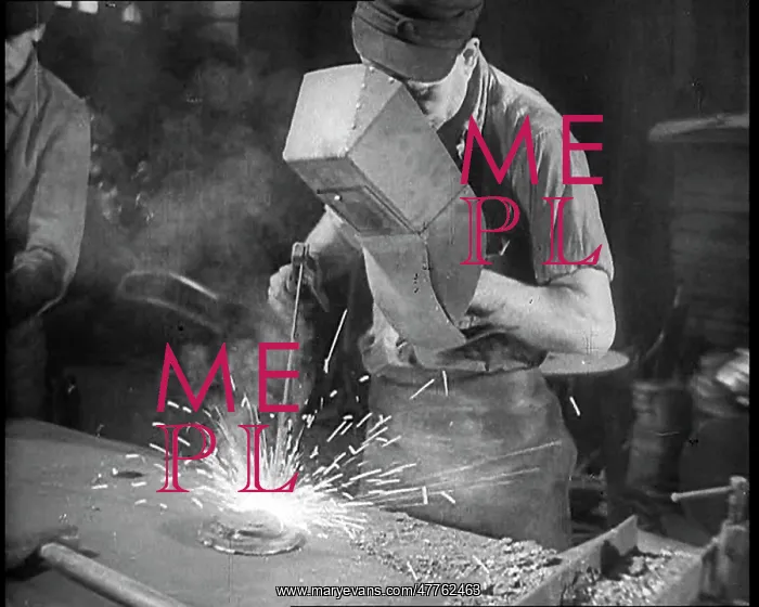 : Two Men Working in a Factory : Two Men Working in a Factory