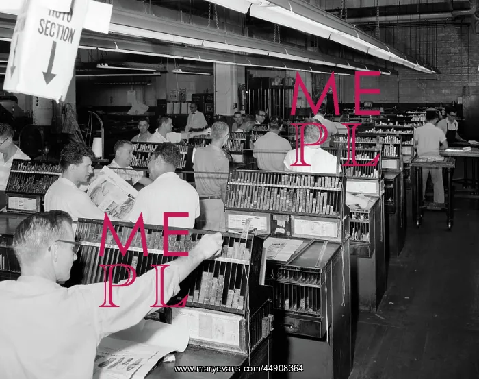 : Men working in newspaper advertisement composing : Men working in newspaper advertisement composing